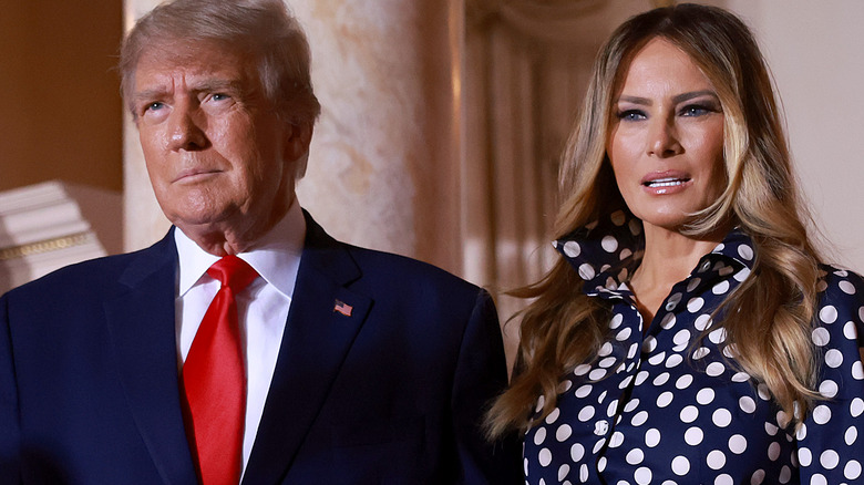 Donald and Melania Trump stand side by side