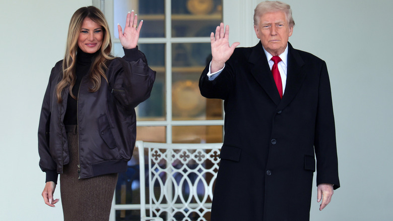 Melania Trump and Donald Trump waving at the 2025 White House turkey pardon