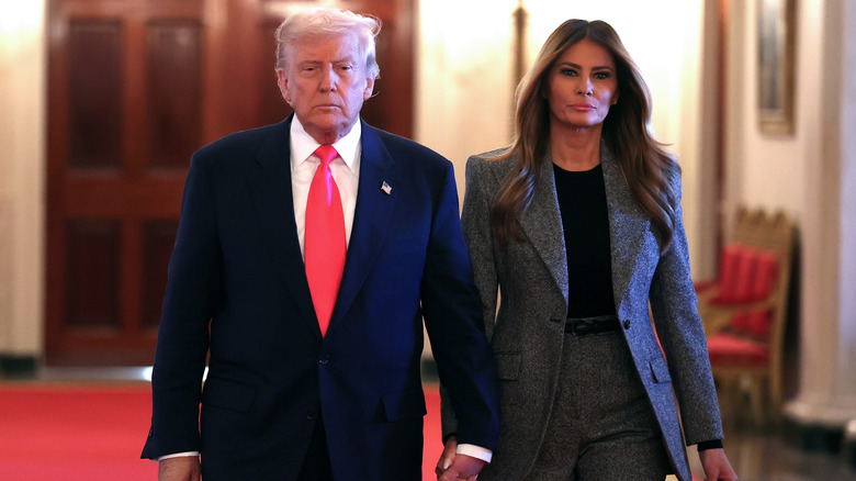 Donald and Melania Trump walking
