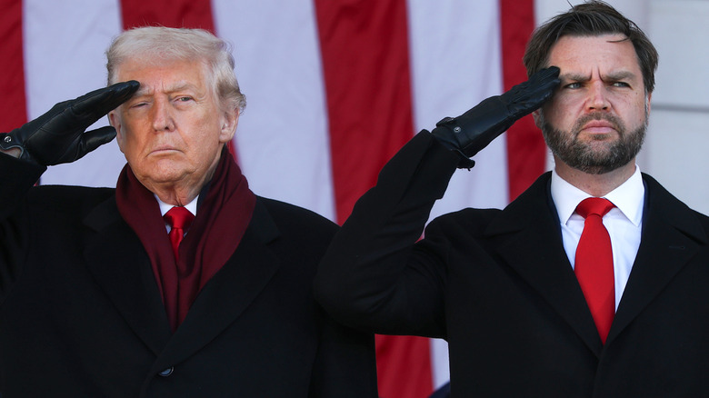 Donald Trump and JD Vance saluting in suits and gloves