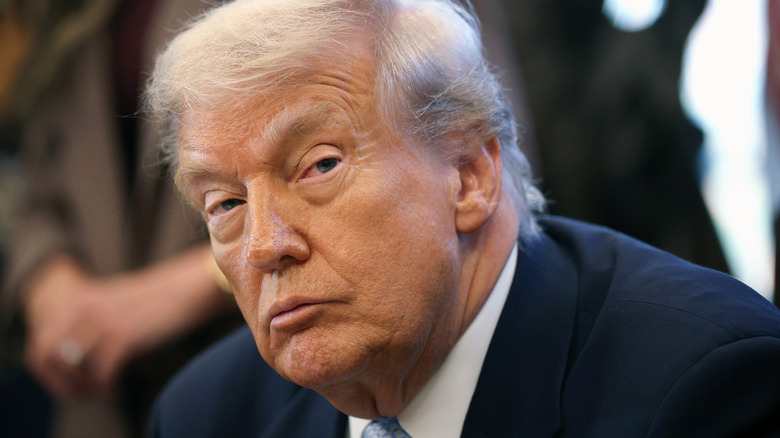 Donald Trump side-eyeing someone out of the shot