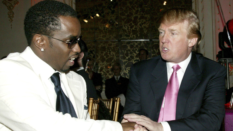Sean "Diddy" Combs smiling at Donald Trump