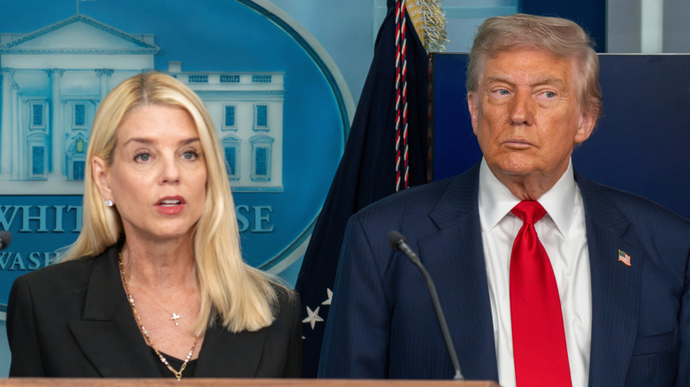 Pam Bondi speaking at the White House with Donald Trump standing behind her