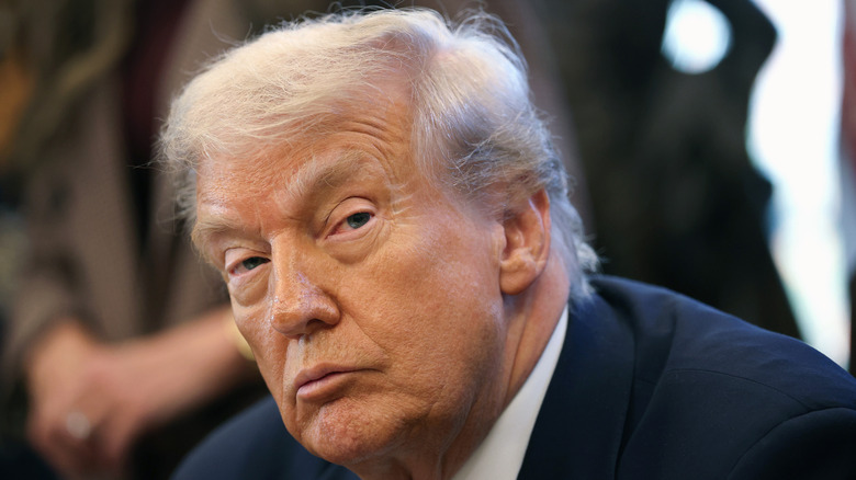 Donald Trump looks to the side