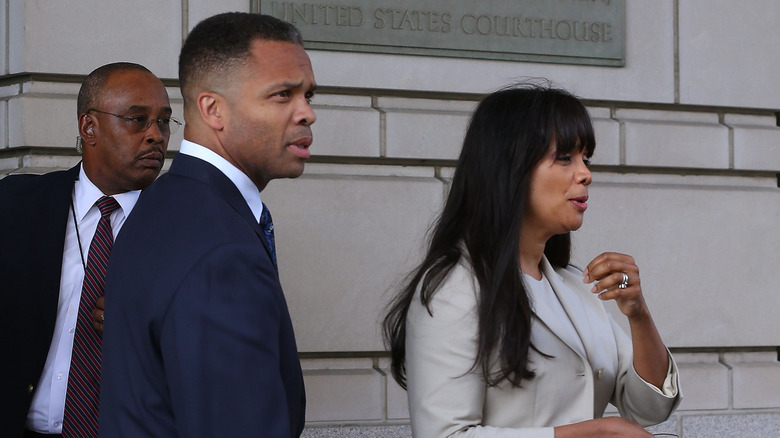 Former Congressman, Jesee Jackson Jr. and his ex-wife, Sandi Jackson, stand side by side