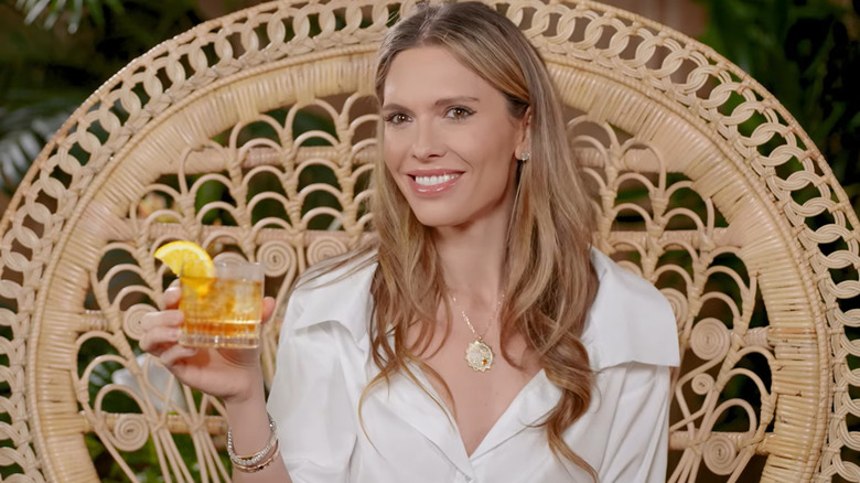 Bettina Anderson holds up a drink during an appearance on 'Sarah's Untitled Talk Show' (2024)