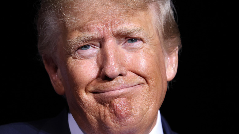 Donald Trump smirk smile October 2022