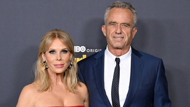 Cheryl Hines and Robert F. Kennedy Jr. posing for a photo