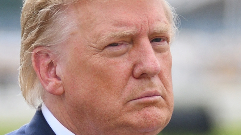 Donald Trump frowning