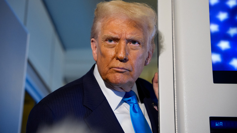 Donald Trump taking questions from reporters