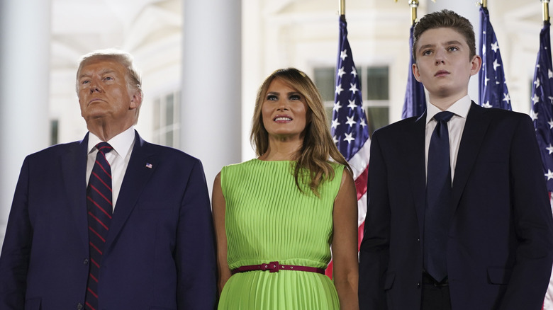 Donald, Melania and Barron Trump standing together