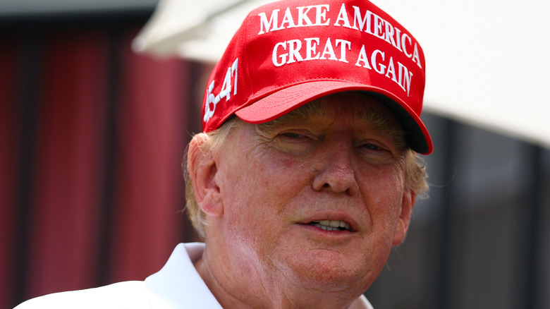 Donald Trump wearing a Make America Great Again hat