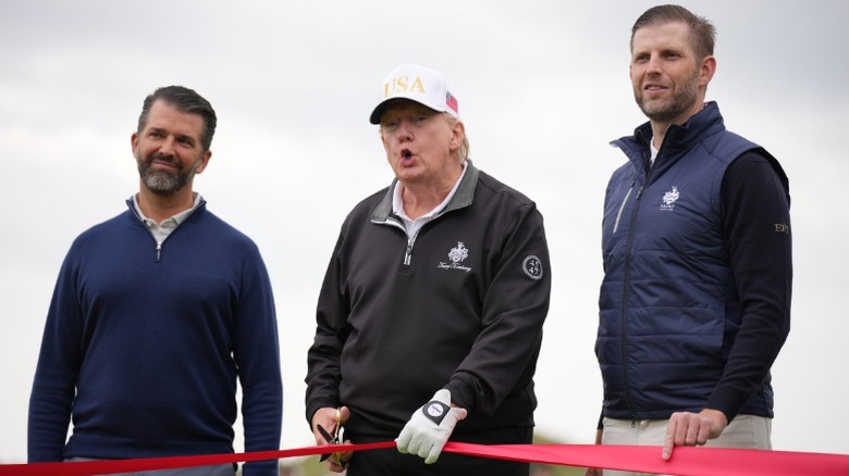 Donald Trump Jr., Donald Trump, and Eric Trump attend the ribbon-cutting ceremony at Trump International Golf Links in Balmedie, Scotland (2025)