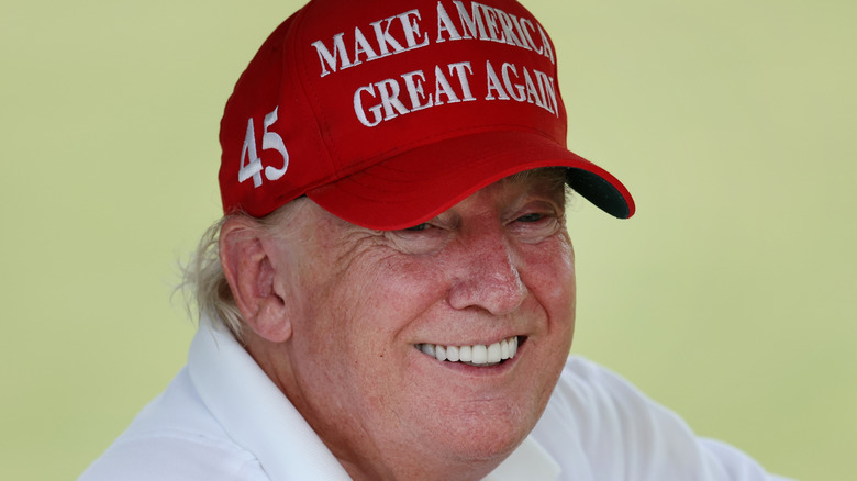 Donald Trump smiling at tournament