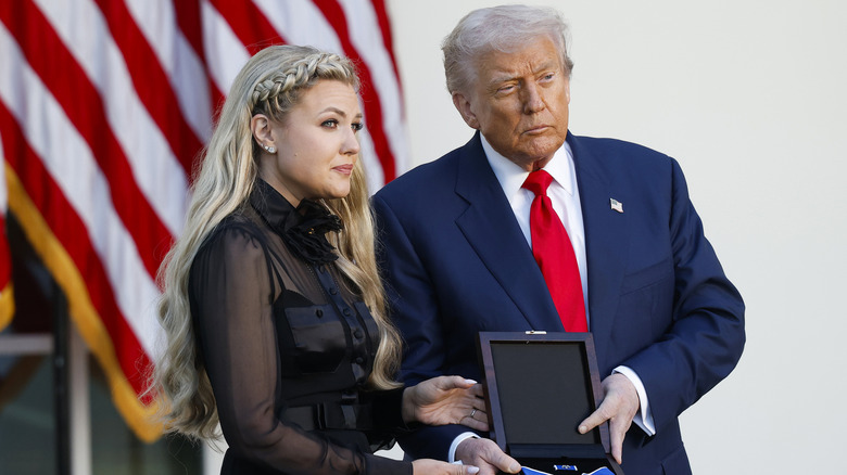 Donald Trump presenting Erika Kirk with the Presidential Medal of Freedom
