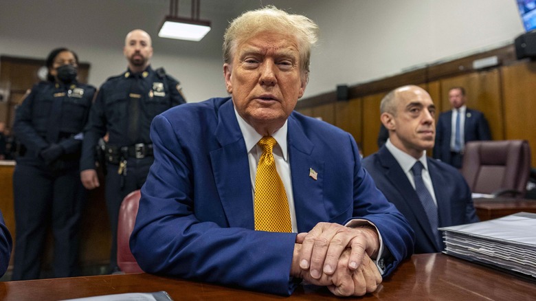 Donald Trump scowling in court