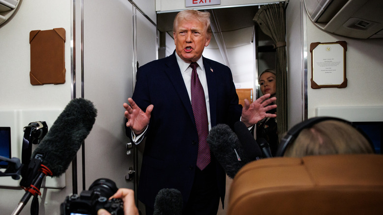 Donald Trump answering questions on Air Force One