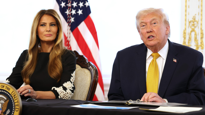 Donald and Melania Trump sitting next to each other