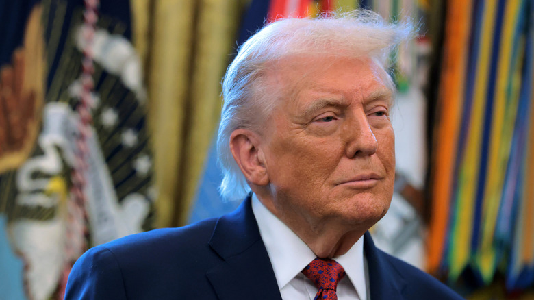 Donald Trump being asked questions in the Oval Office