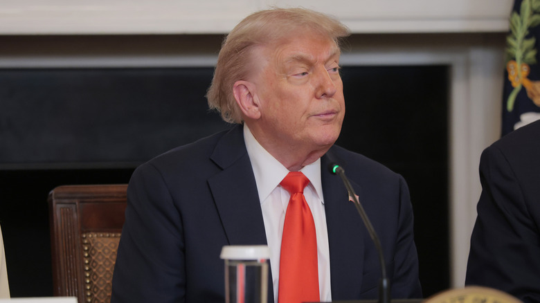 Donald Trump looking away from the camera