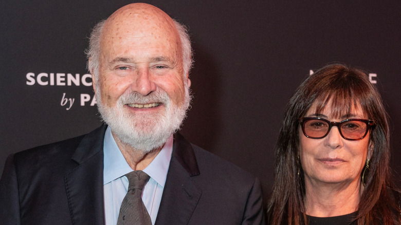 image of the late director Rob Reiner and his wife Michele Reiner smiling at the red carpet of an event