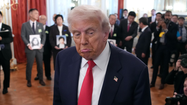 Donald Trump reacting to a reporter's question