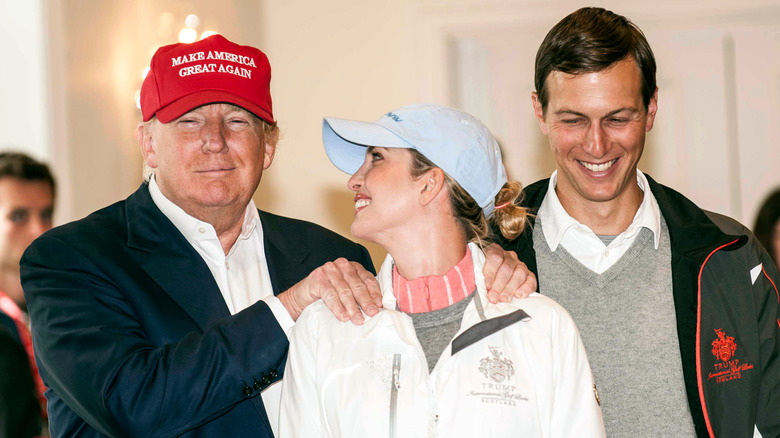 Donald Trump smiling and walking with Ivanka Trump and Jared Kushner
