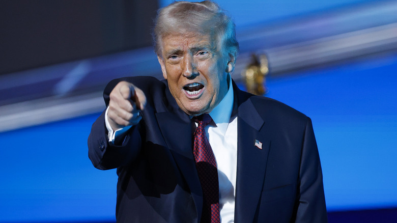 Donald Trump pointing a finger at someone
