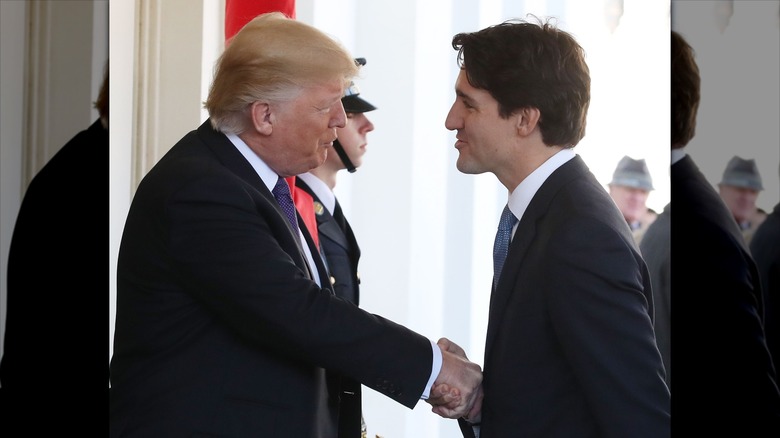 Justin Trudeau and Donald Trump shaking hands at White House in February 2017