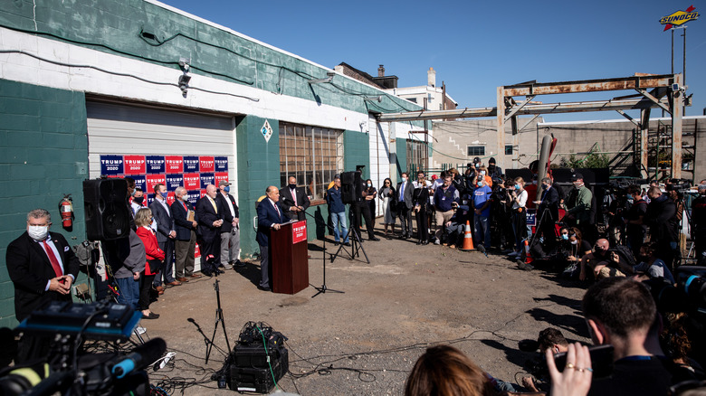 Rudy Giuliani holding a press conference at Four Seasons Total Landscaping