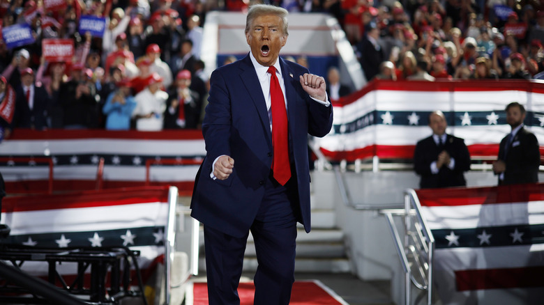 Donald Trump doing a comic-looking dance at a rally