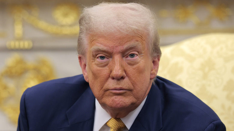 Donald Trump stares straight ahead