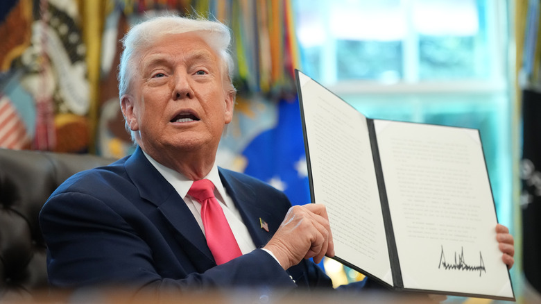 Donald Trump showing his signature