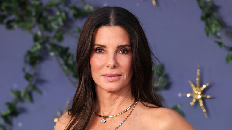 Sandra Bullock in leopard print strapless dress