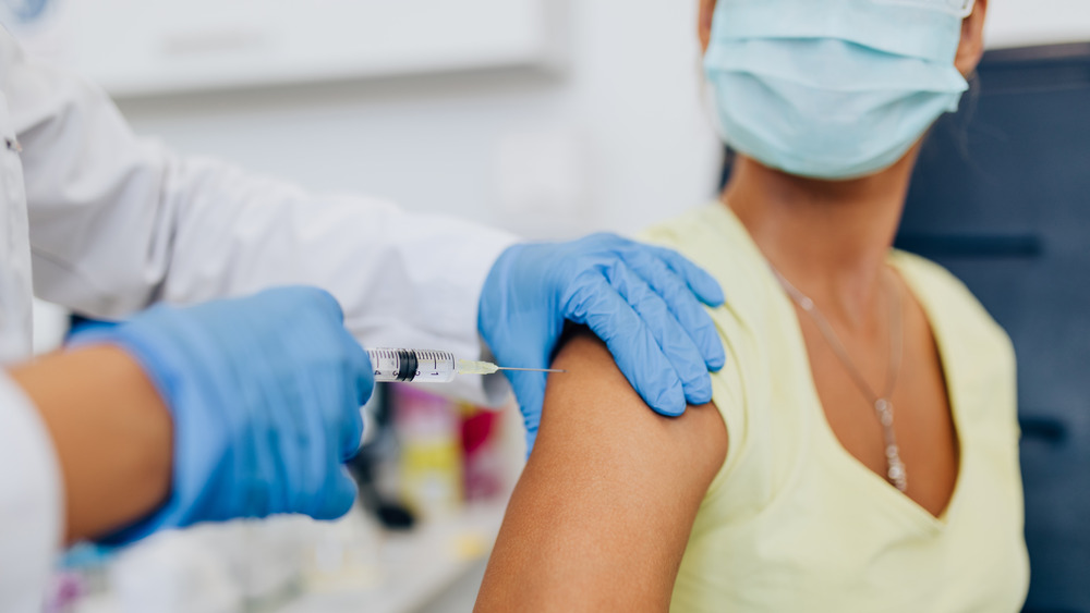 Woman getting COVID shot