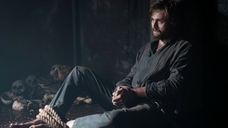 Douglas Booth tied up