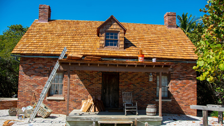 Photo of a brown historic home in Florida under construction