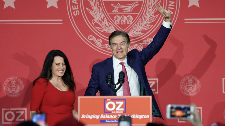 Republican U.S. Senate candidate Dr. Mehmet Oz celebrates with his wife Lisa Oz during an election night event at the Newtown Athletic Club November 8, 2022 in Newtown, Pennsylvania.