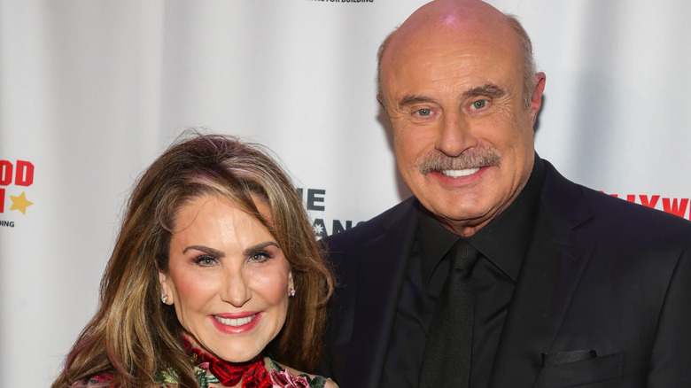 Robin and Dr. Phil McGraw smiling