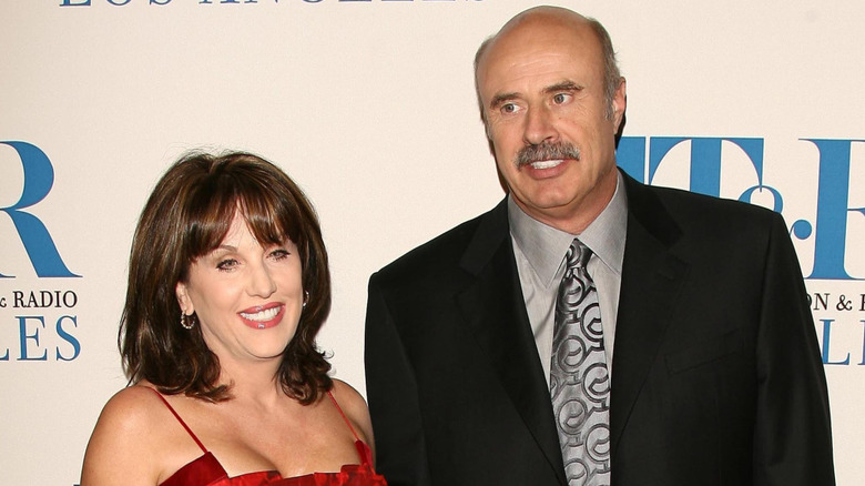 Phil McGraw and Robin McGraw smiling