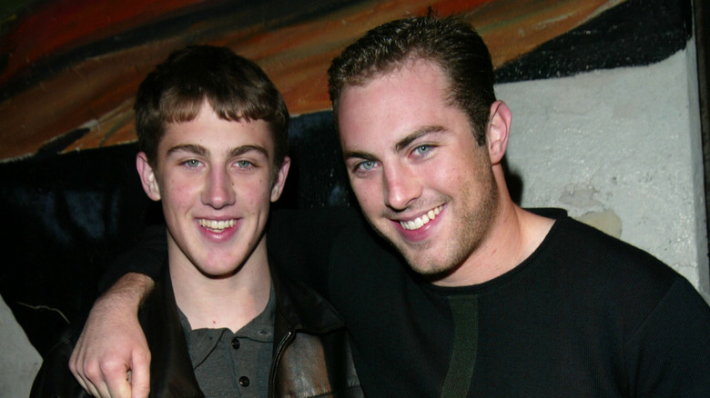 Jay and Jordan McGraw posing together and smiling at an event in 2002