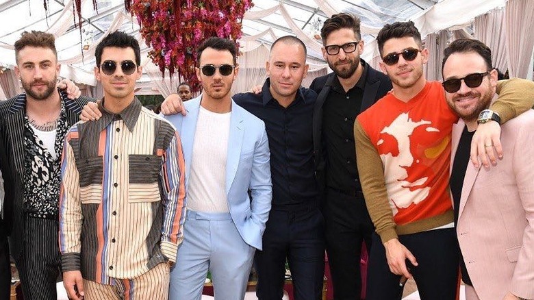 Dr. Phil's son Jordan McGraw poses at brunch with his bandmates and the Jonas brothers.