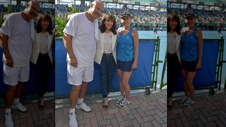 Dr. Phil and Robin McGraw with Chris Evert courtside