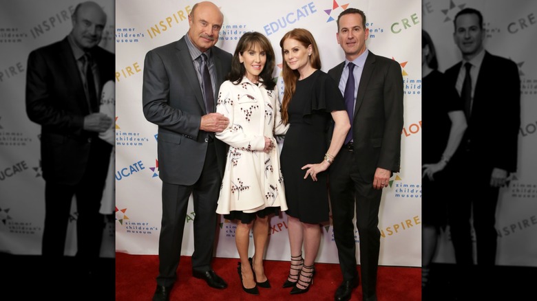 Phil McGraw, Robin McGraw, Vanessa Frank, and Darryl Frank posing together at an event