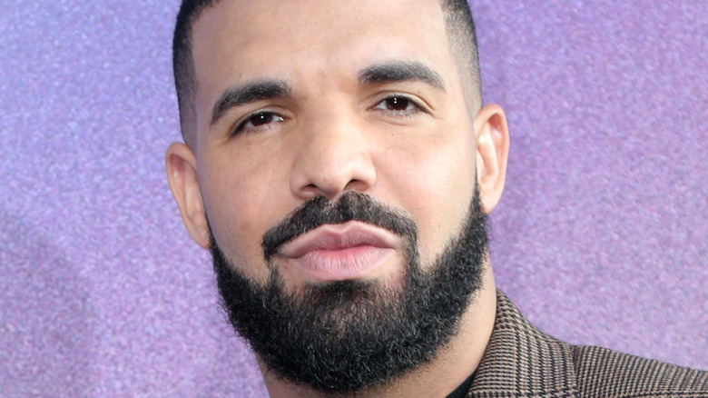 Drake standing on the red carpet