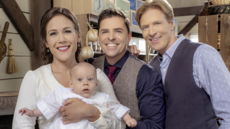 Erin Krakow, Kavan Smith, and Jack Wagner posing with baby