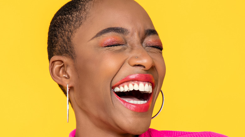 Woman wearing pink lipstick 