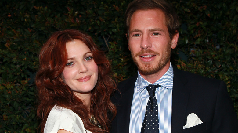 Drew Barrymore and Will Kopelman smiling