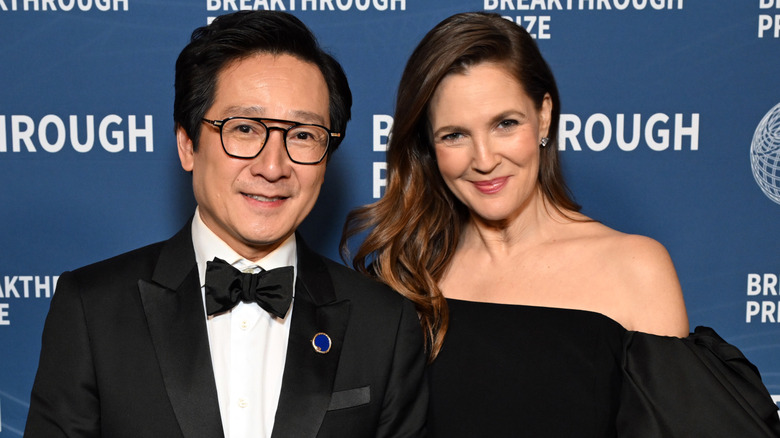 Ke Huy Quan and Drew Barrymore attend an event