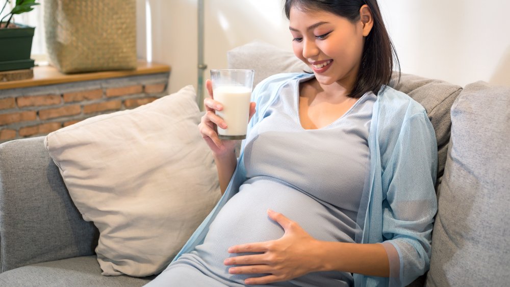 pregnant woman with milk